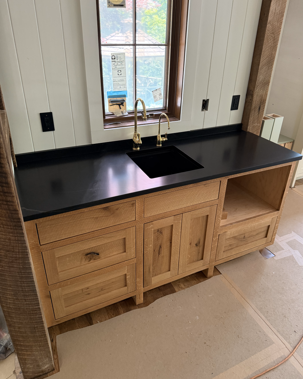 Black Piano Quartzite with a leather finish.